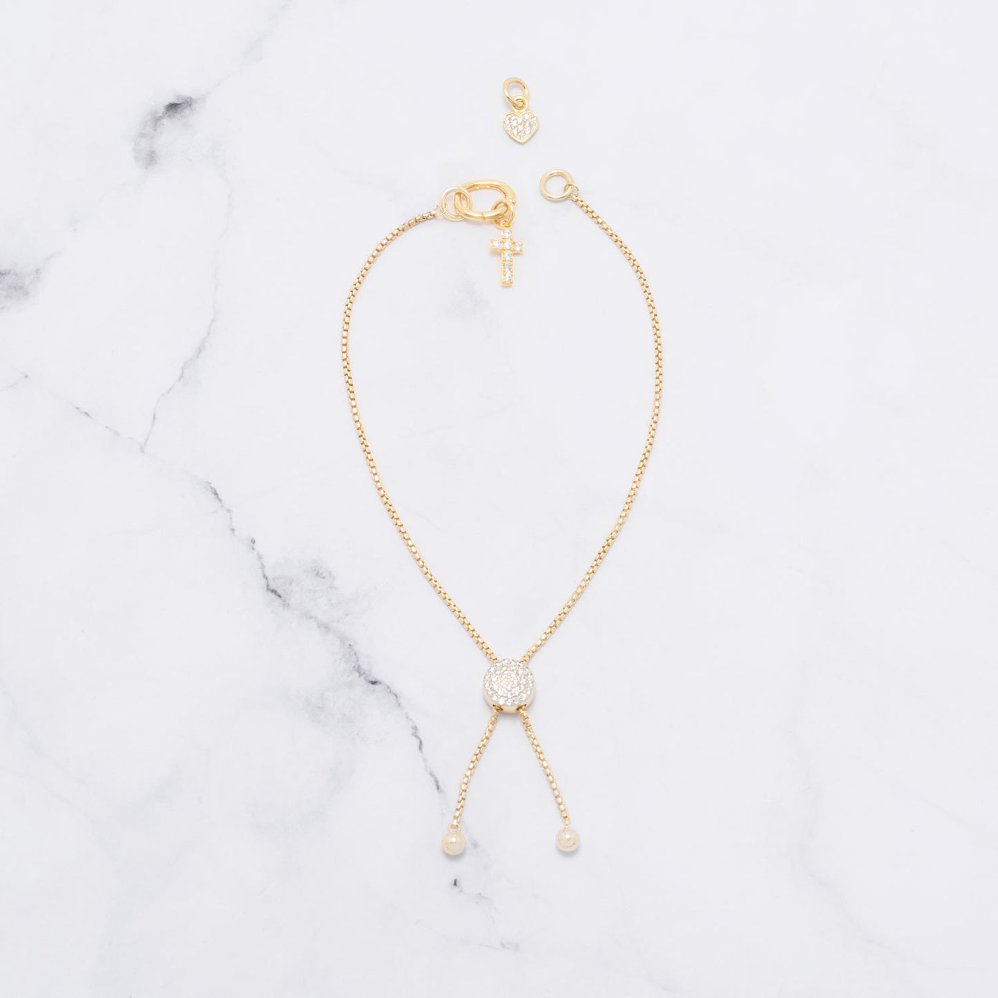 Componente adaptador chapado en oro de 14 quilates.