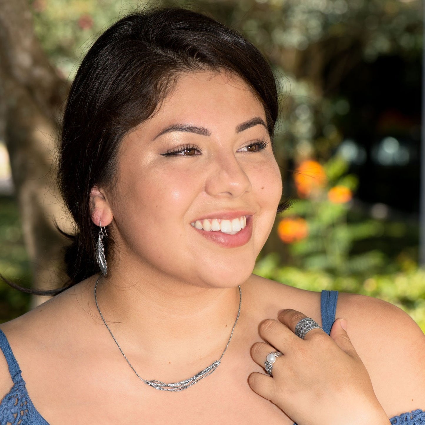 Pendientes de plumas oxidadas