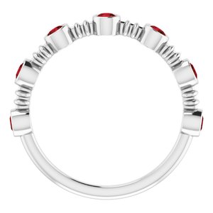 Anillo de platino con granate de Mozambique en engaste de bisel