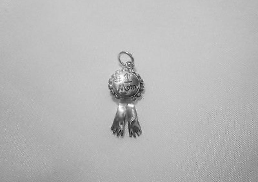 Dije de cinta de mamá 