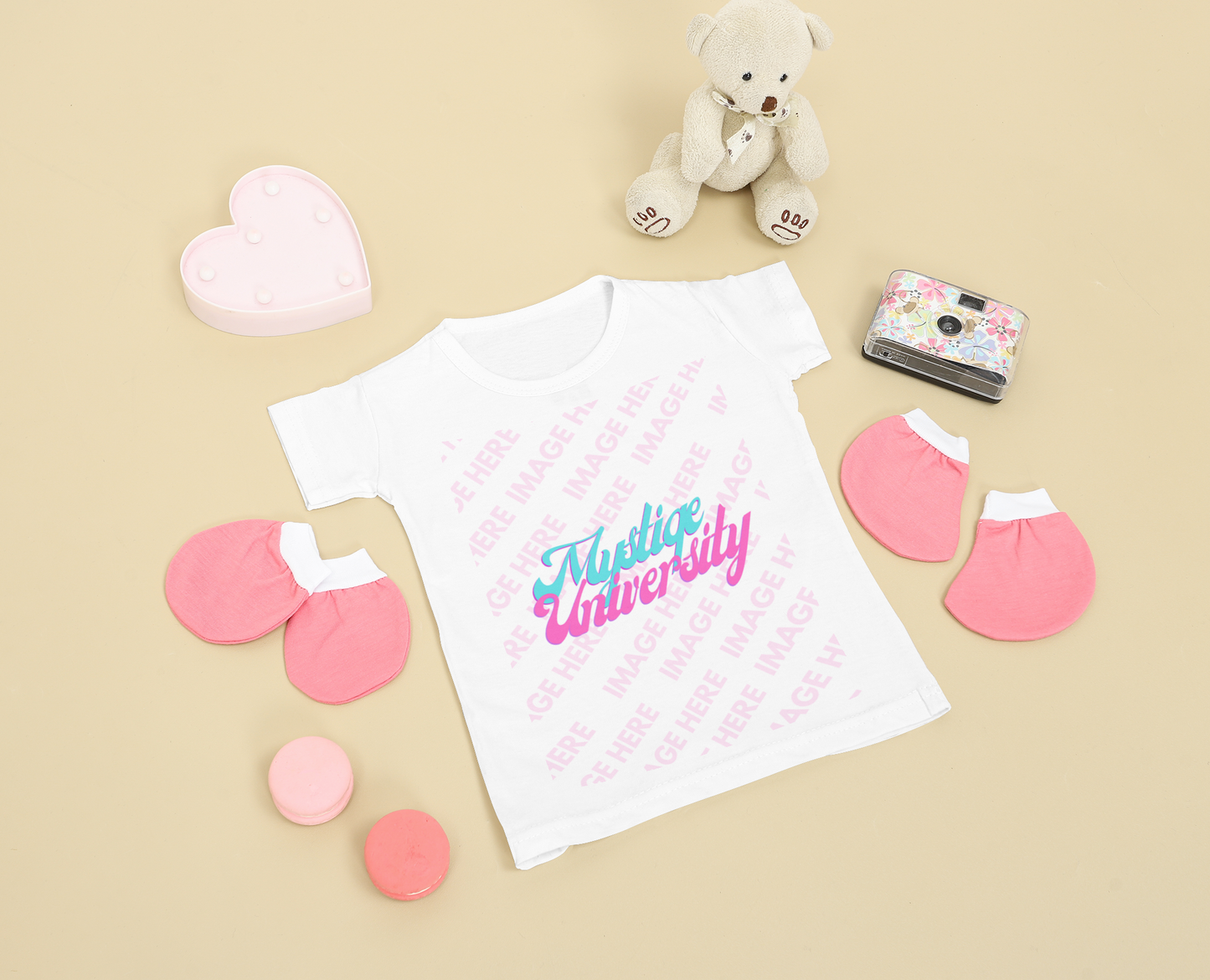 Baby Shirt Mockup With Two Pair of Baby Gloves