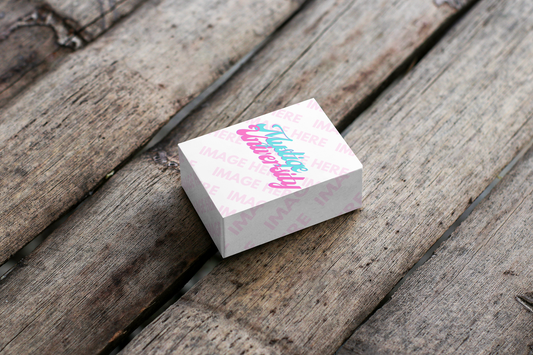 Small Box Mockup Placed on Top of a Bamboo Flooring